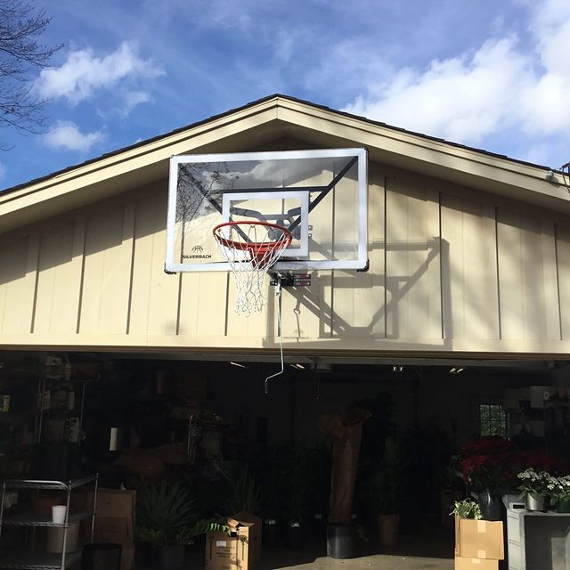 Basketball goal mounted over garage