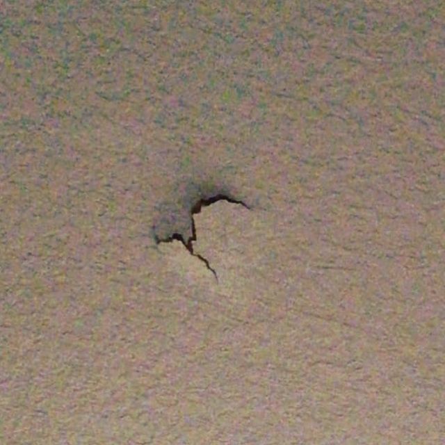 Hole in drywall.