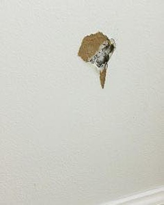 Hole in drywall.