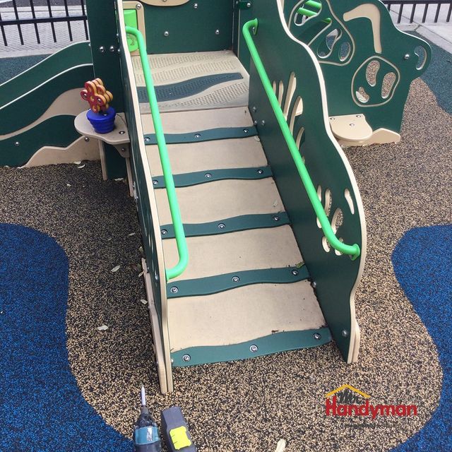 Tightened hand rail on playground equipment