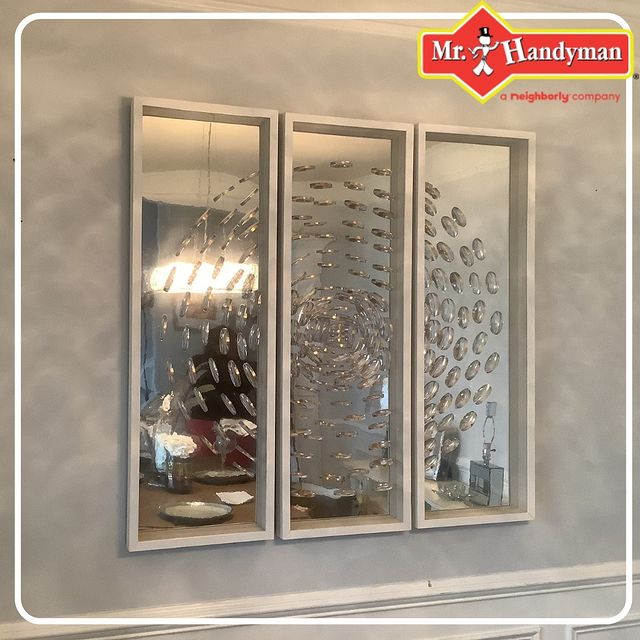 Heavy glass piece of hanging assembled on the wall with a great ease