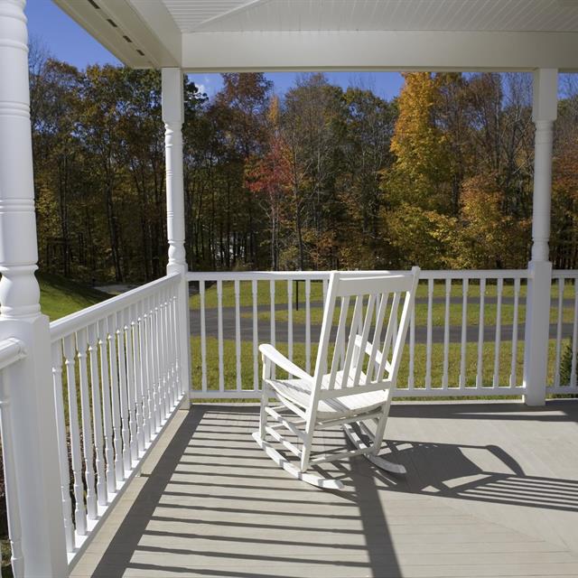 Picture of a deck with a rocking chair