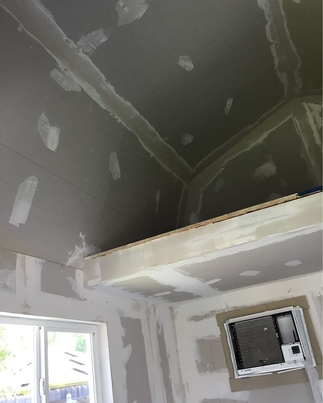 shed we installed insulation and drywall in