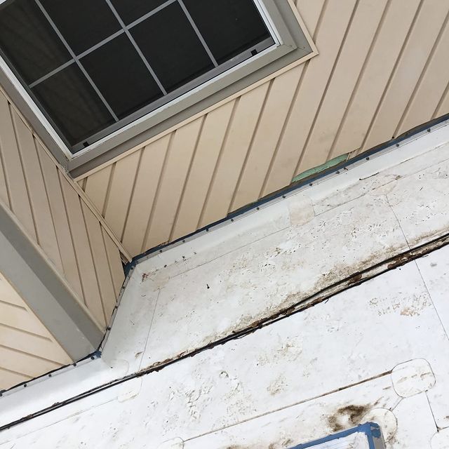 Siding repair around window