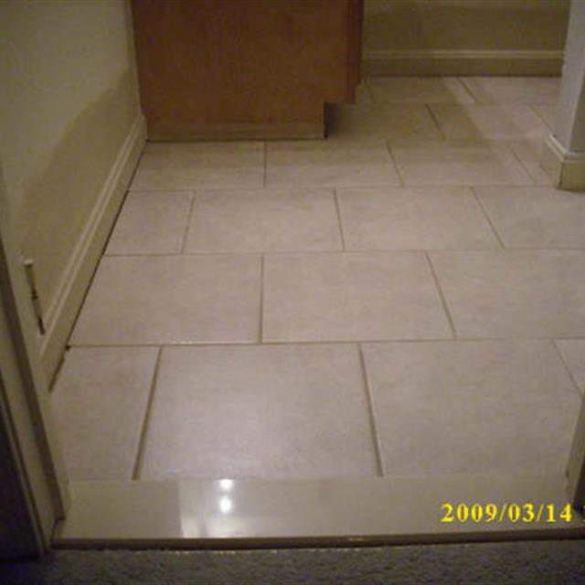 Picture of tile floor repair at a home