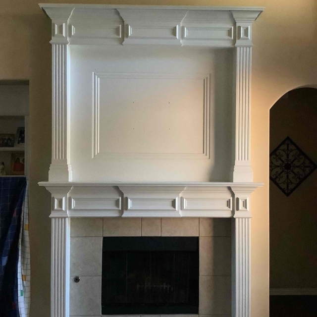 New fireplace mantle in living room.