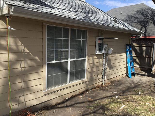 house with tan siding