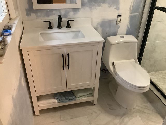 Vanity, toilet, and sink install