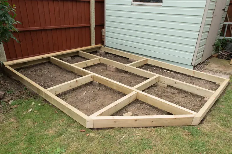 Joists laid out to frame a floating deck.