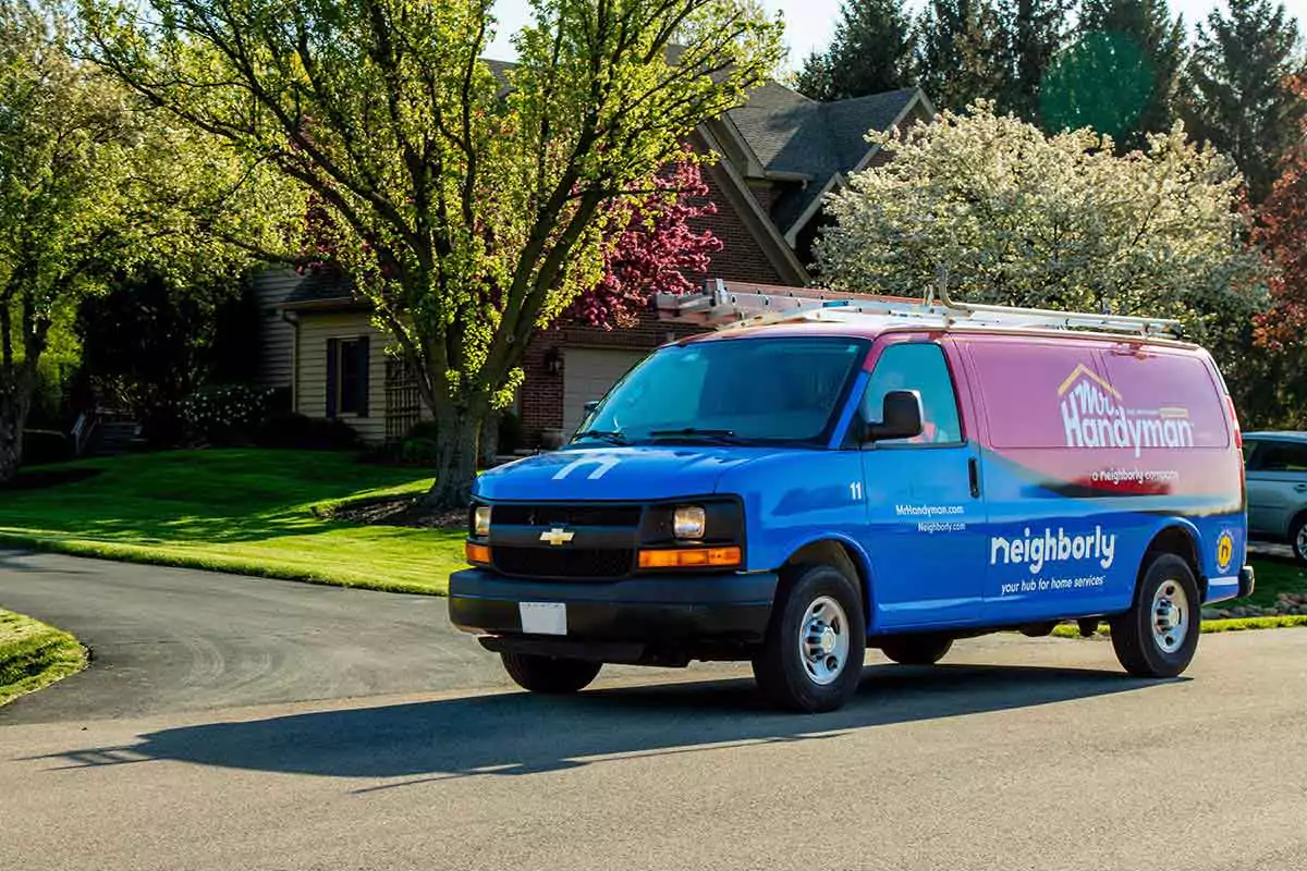 A Mr. Handyman’ service van en route to complete a fence installation project.