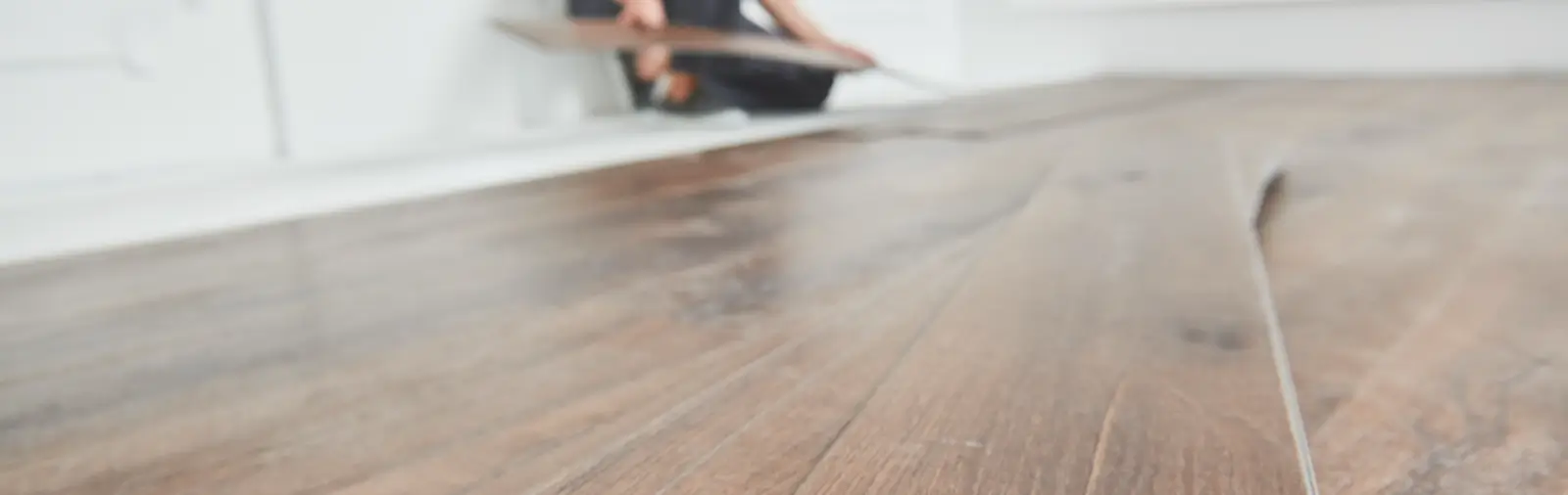 New vinyl plank flooring being installed