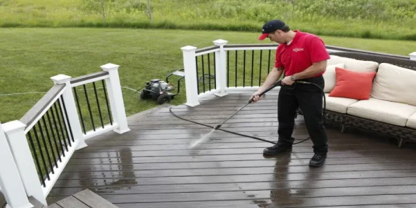 man powerwashing