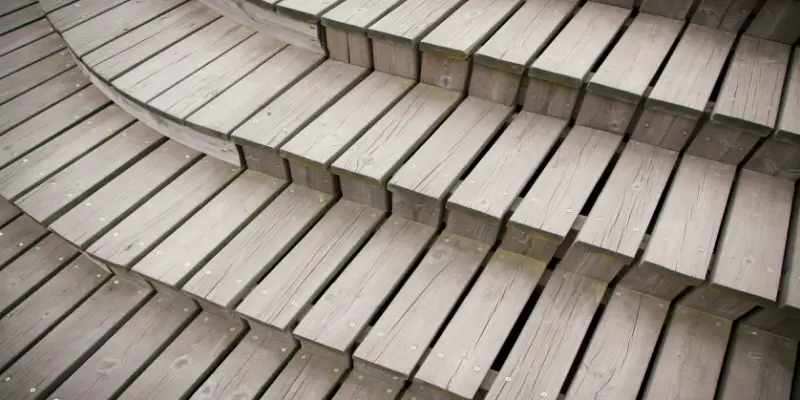 An overview shot of deck stairs. Very geometric image with straight, even lines between each deck tread/board.