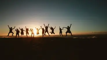 people standing and cheering