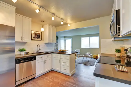 White clean kitchen with stainless steel