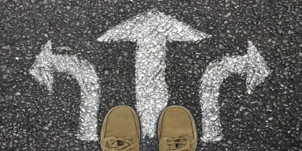 Shoes standing above three arrows pointing, left, center, right