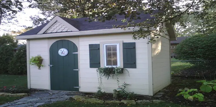 Green and white shed.