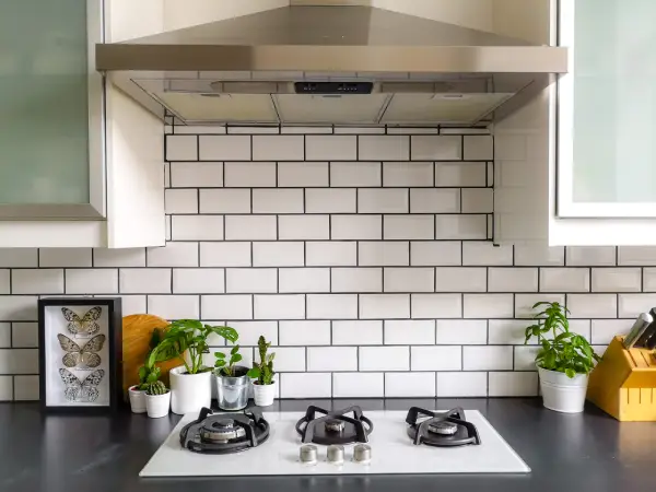 Black White Subway Tiled Kitchen.