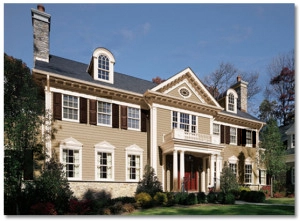 Classical colonial style home showcasing traditional exterior paint colors.