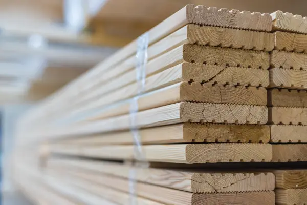 a stack of tied wooden boards for deck materials.