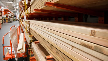 Lumber inside home improvement store.