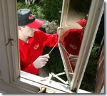 Home window repair Mr. Handyman technician.