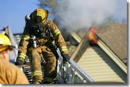 Fire rescue team in a house roof.