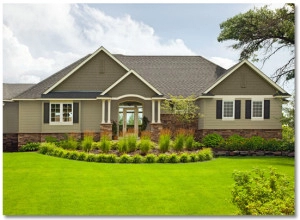 A house with a spacious yard and beautiful landscaping.