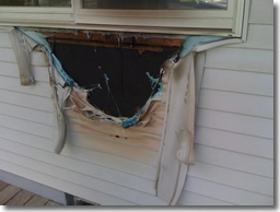 Vinyl Siding melted by propane grill.