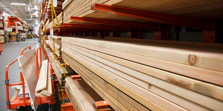 Lumber inside home improvement store.