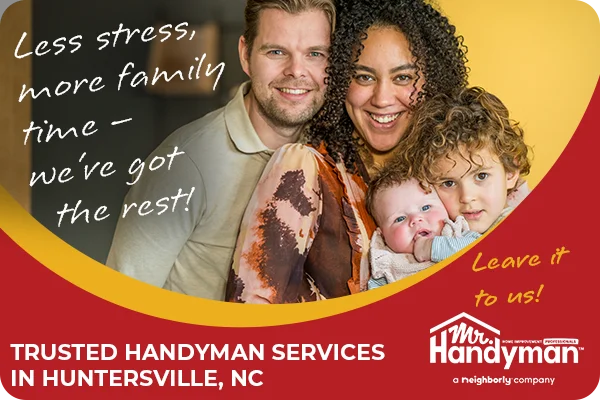 Happy family outside a well-maintained home in Huntersville, NC.