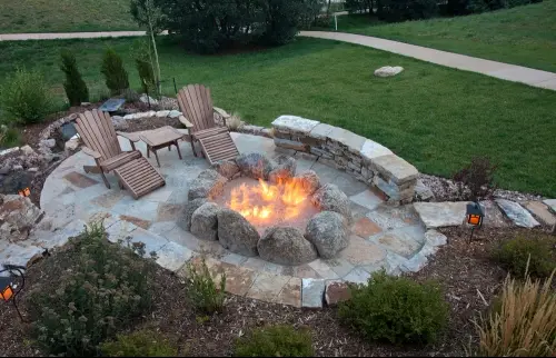 Outdoor fireplaces warm up deck or patio with gas fireplace.