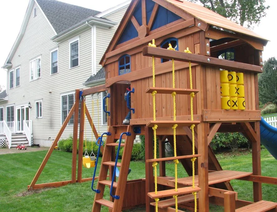 Playset in backyard.