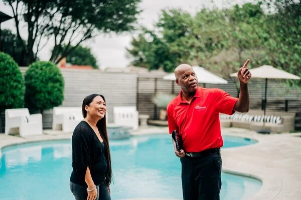 Mr. Handyman with customer outside of Haymarket home