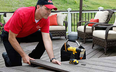 Mr. Handyman expert installing a deck.