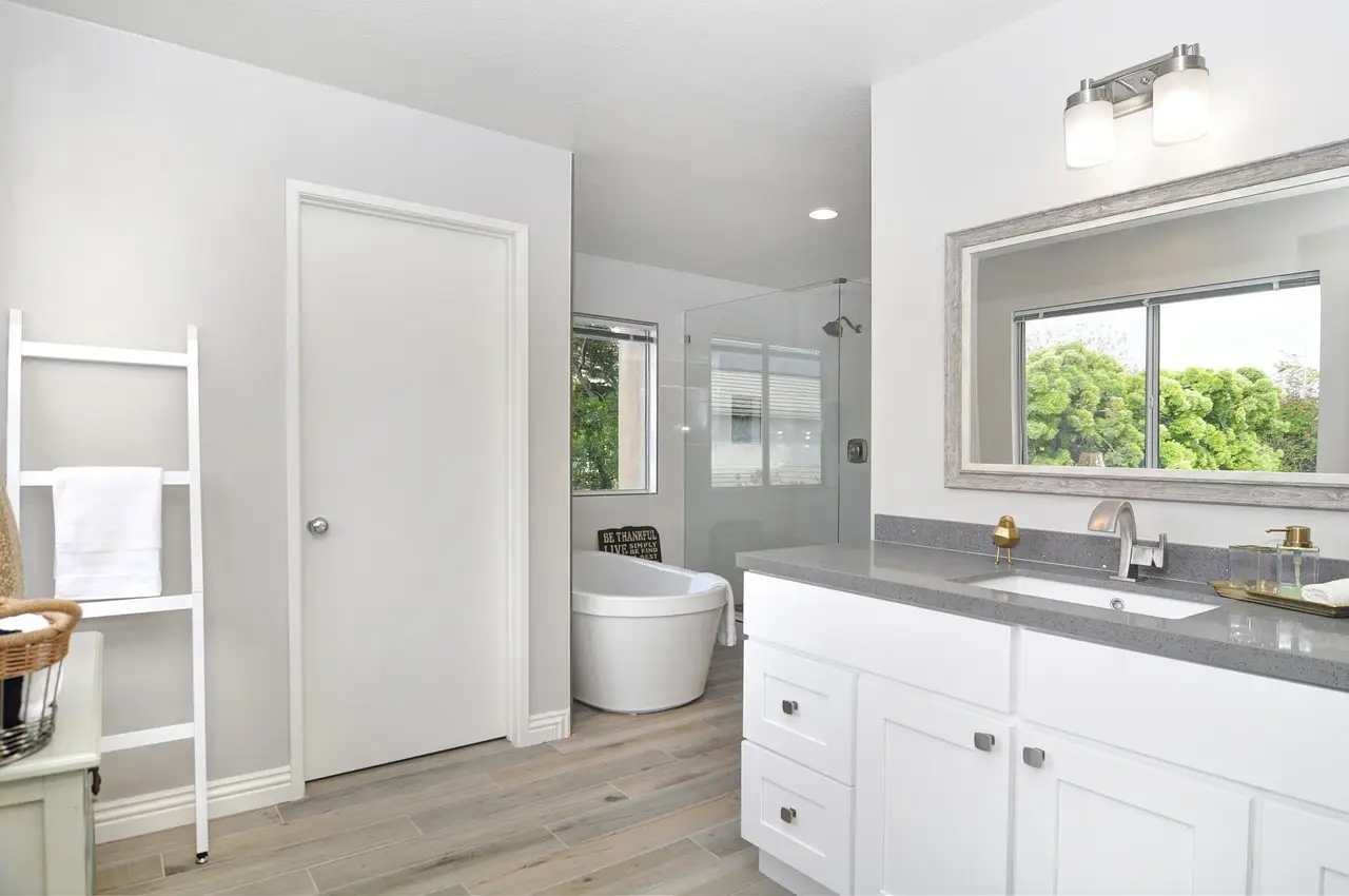 A newly completed small bathroom remodel in Vancouver, WA, with modern bathroom features and a glass shower enclosure.