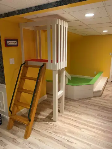 custom play set with yellow walls