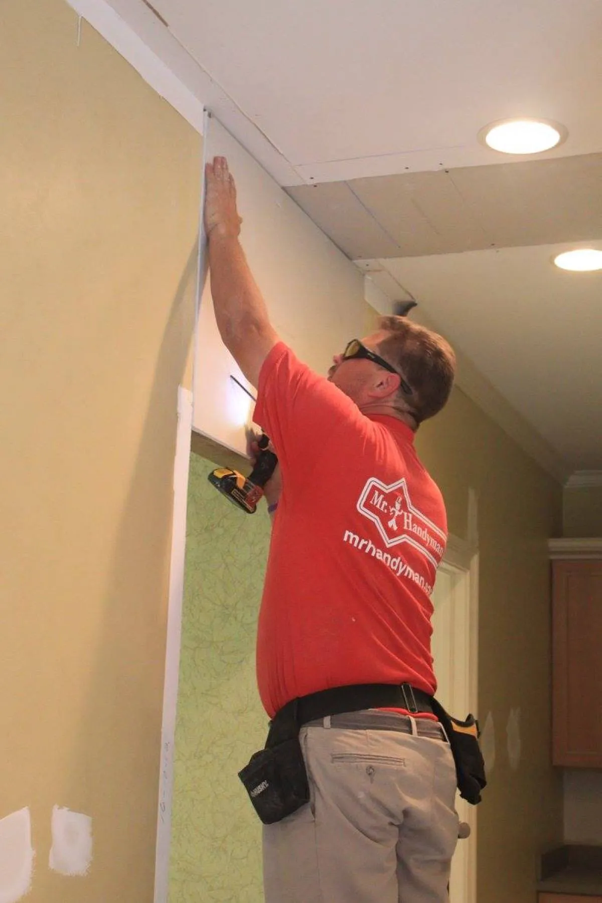 Mr. Handyman professional completing drywall repair in Jacksonville.