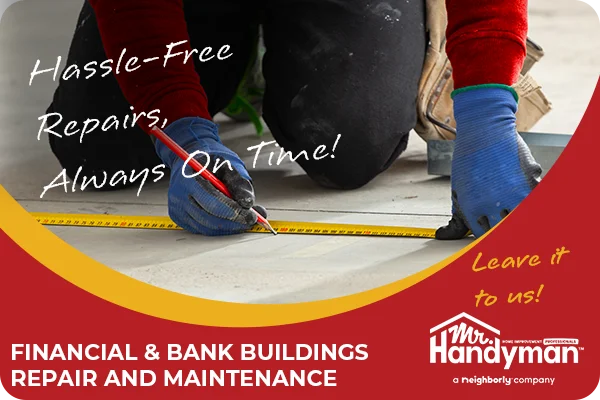 A professional handyman repairing the floor of a bank building.