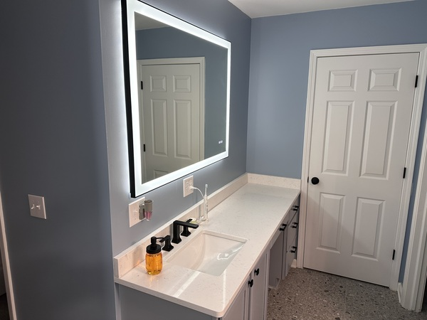 Vanity and mirror installation done during a bathroom remodel in Ann Arbor, MI by My Handyman.