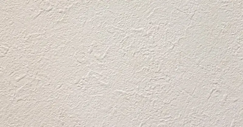 A close-up of a textured drywall surface that has been added to a home with professionals services for texturing in frisco, TX.