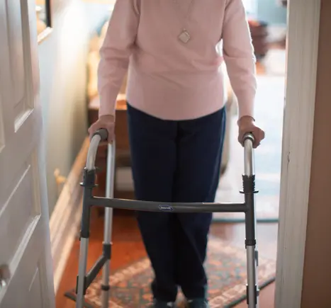 elderly woman with walker.