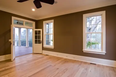 Empty room with crown molding.