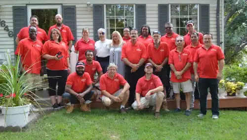 2018 team photo in front of veteran's home for National Day of Service.