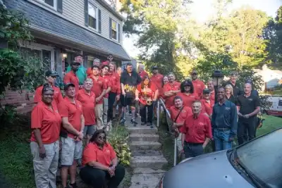 2022 team photo in front of veteran's home for National Day of Service.