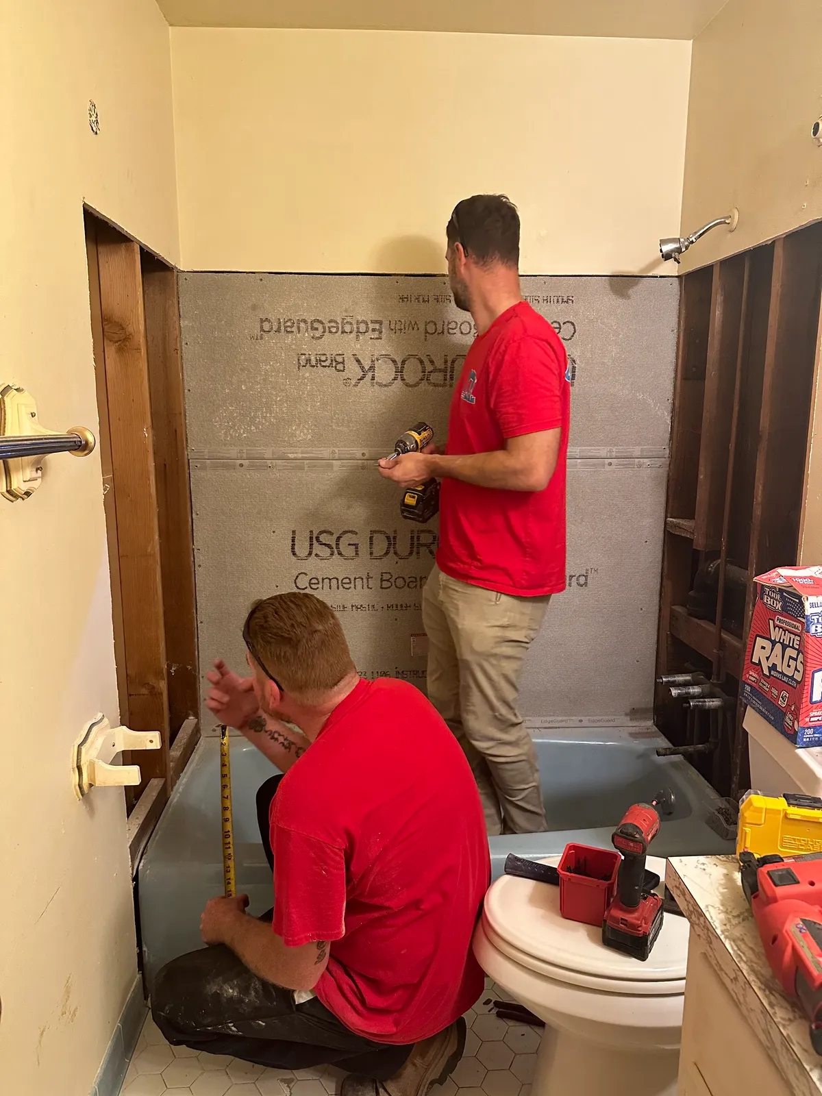 Mr. Handyman professionals completing a bathroom drywall installation in Collierville, TN