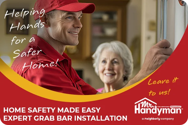 Handyman installs grab bar while senior woman smiles nearby.